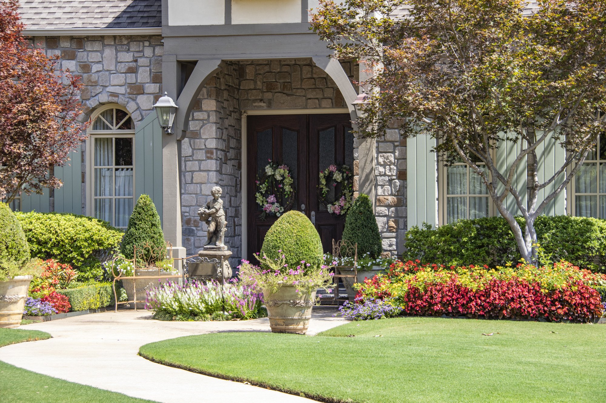 If your front yard is looking a bit shabby it's probably time to update it - but how? Well, here are four cheap and simple front yard landscaping ideas,
