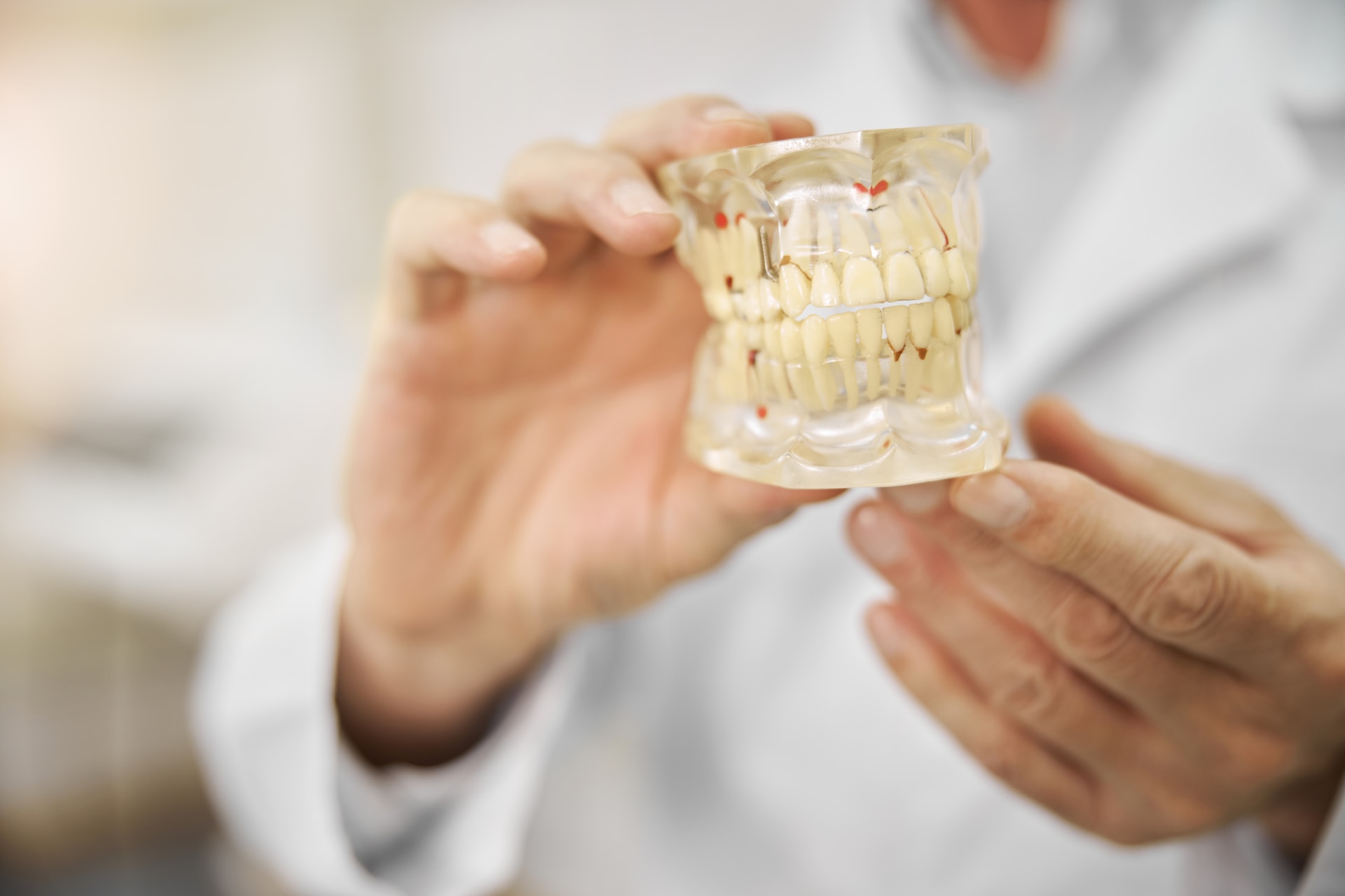 The Power of Dental Implants: How a Periodontist Can Transform Your Smile